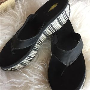 Wedge heel flip flops
